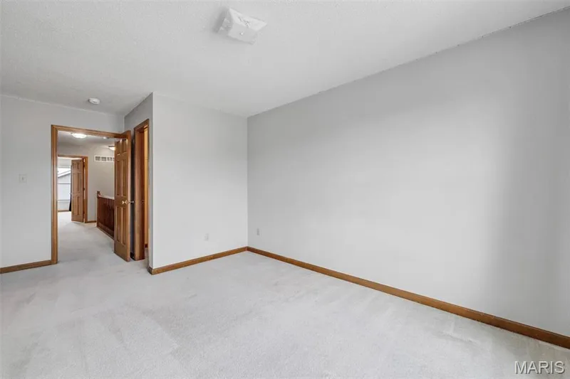 Upstairs bedroom with walk-in closet — 195 England Drive, O'Fallon, MO 63366
