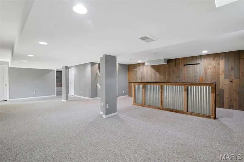 finished basement with bar area — 195 England Drive, O'Fallon, MO 63366