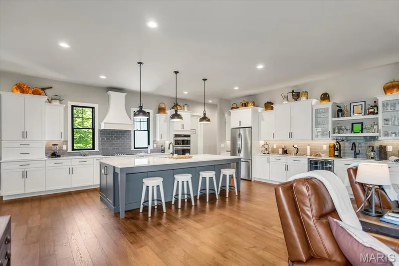 Huge kitchen island is the heart of the home — 4444 Augusta Shores Drive, Augusta, MO 63332