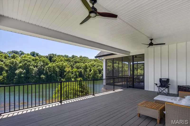 Composite deck next to the screened porch.  You can stay dry here too with plenty of cover — 4444 Augusta Shores Drive, Augusta, MO 63332