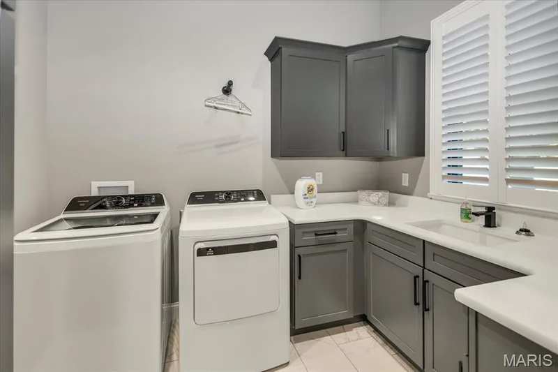 Laundry Room of your dreams can be accessed through the Primary Ensuite or via the hallway off the 2-car garage entrance — 4444 Augusta Shores Drive, Augusta, MO 63332
