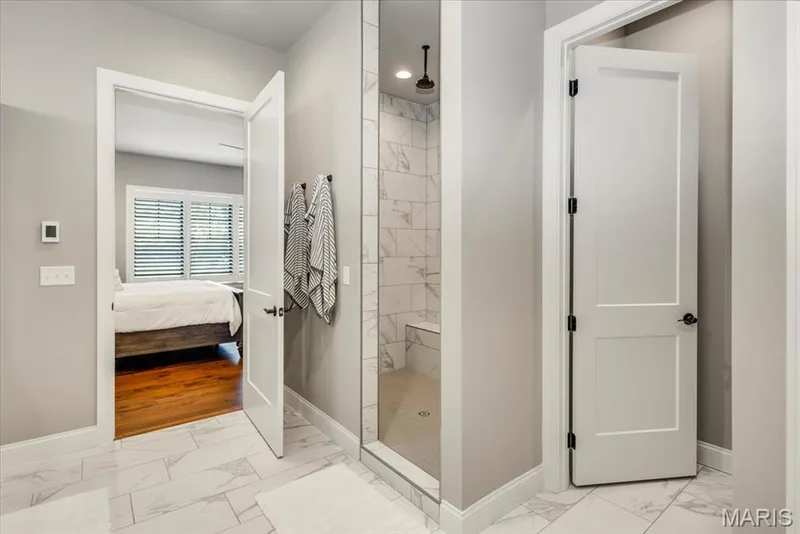 Another view of the Primary Ensuite showing the door to the private potty room — 4444 Augusta Shores Drive, Augusta, MO 63332