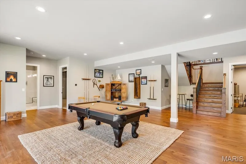 Lower Level Recreation Room with engineered hardwoods continuing  on this level — 4444 Augusta Shores Drive, Augusta, MO 63332
