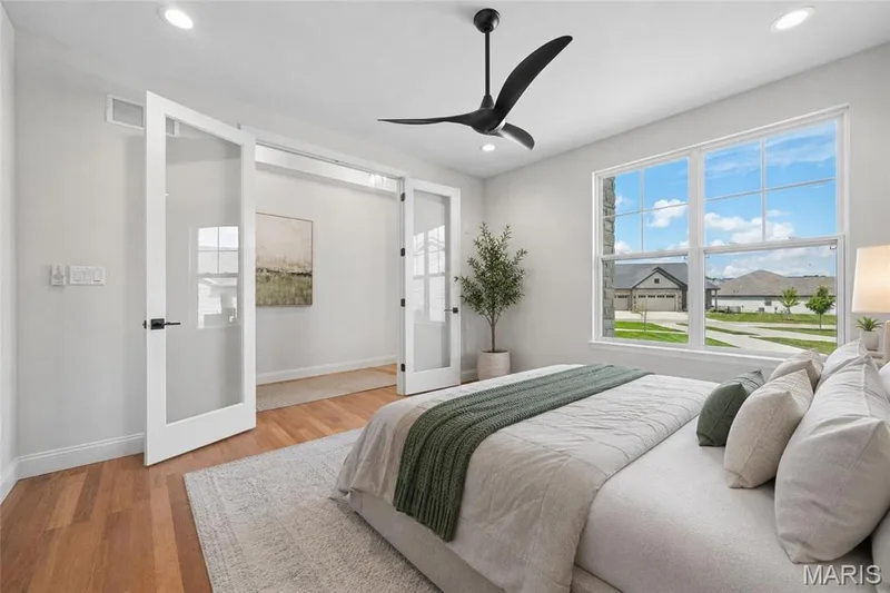 Virtually staged bedroom 3 currently used as an office — 514 Crail Court, O'Fallon, MO 63368