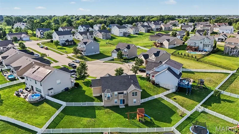 Aerial view highlighting the home’s desirable cul-de-sac location with a large, level backyard — 18 Sonnet Way Court, Wentzville, MO 63385