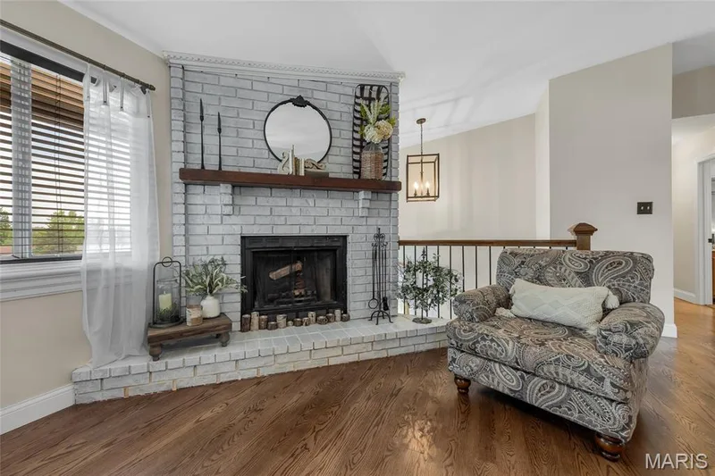 Wood burning fireplace for cozy winter nights — 16 La Rochelle Court, Lake St. Louis, MO 63367
