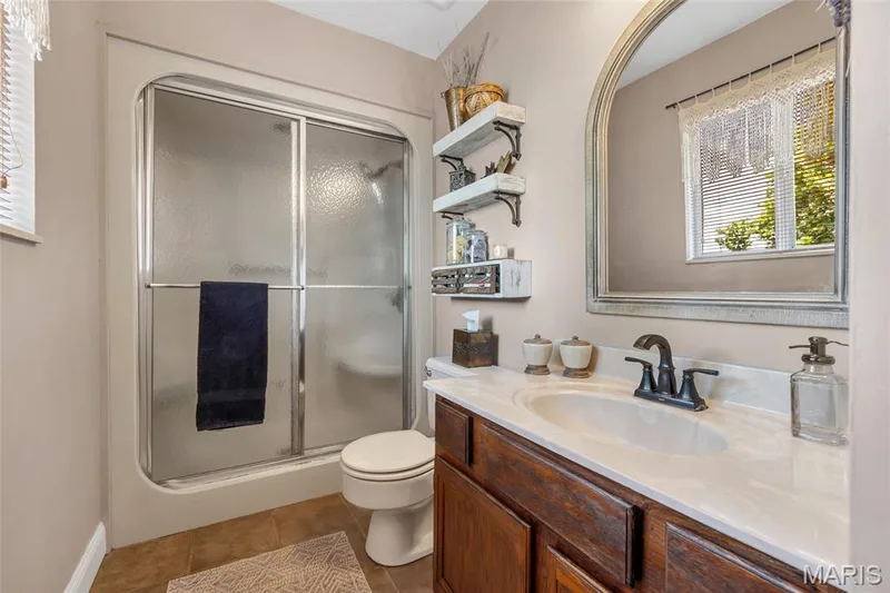 Primary Bathroom includes the luxury of a steam shower cabinet! — 16 La Rochelle Court, Lake St. Louis, MO 63367