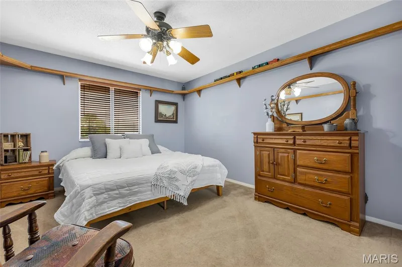 Bedroom #2 is spacious enough for a king size bed! Also features a model train that encircles the room and tunnels through the closet! — 16 La Rochelle Court, Lake St. Louis, MO 63367