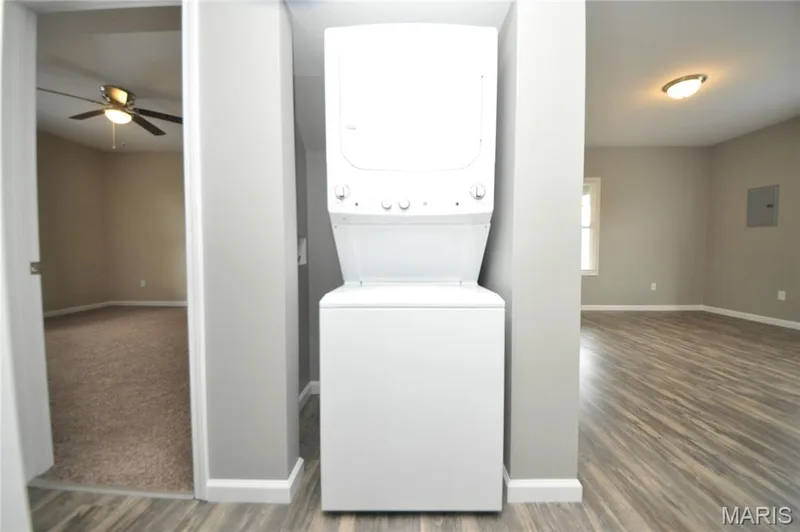 Vertical white stacked washer and dryer unit — 502 S Linn Avenue, Wentzville, MO 63385