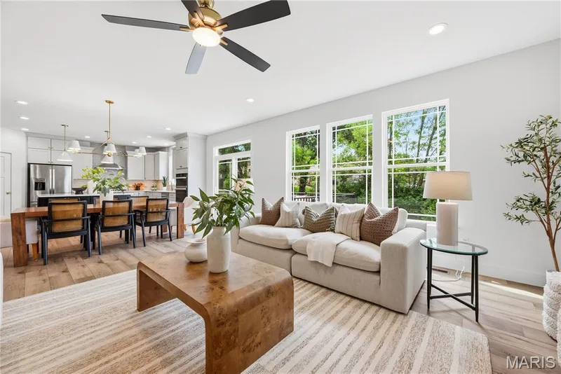 Open Floor Plan, Great Room, Breakfast Room and Kitchen with 9 Foot Ceilings, Recessed Lights and Luxury Vinyl Plank Flooring — 527 Ryehill Drive, St Peters, MO 63376
