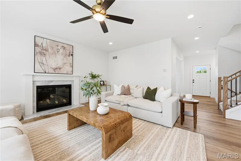 Gas Fireplace with Marble Surround in Great Room — 527 Ryehill Drive, St Peters, MO 63376