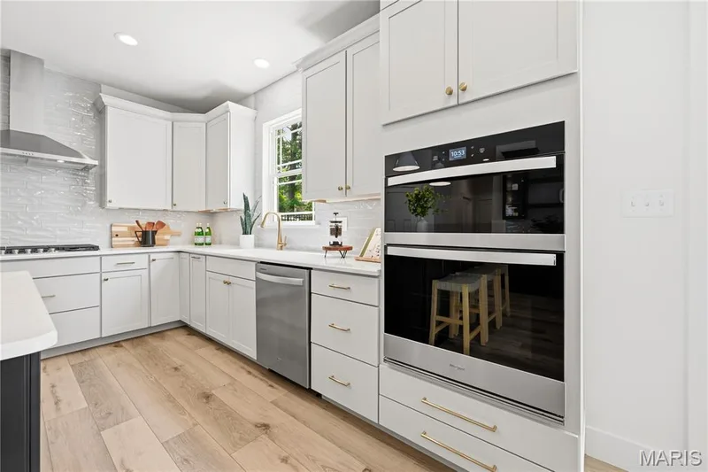 Wall Ovens and Stainless Steel Appliances in Kitchen — 527 Ryehill Drive, St Peters, MO 63376