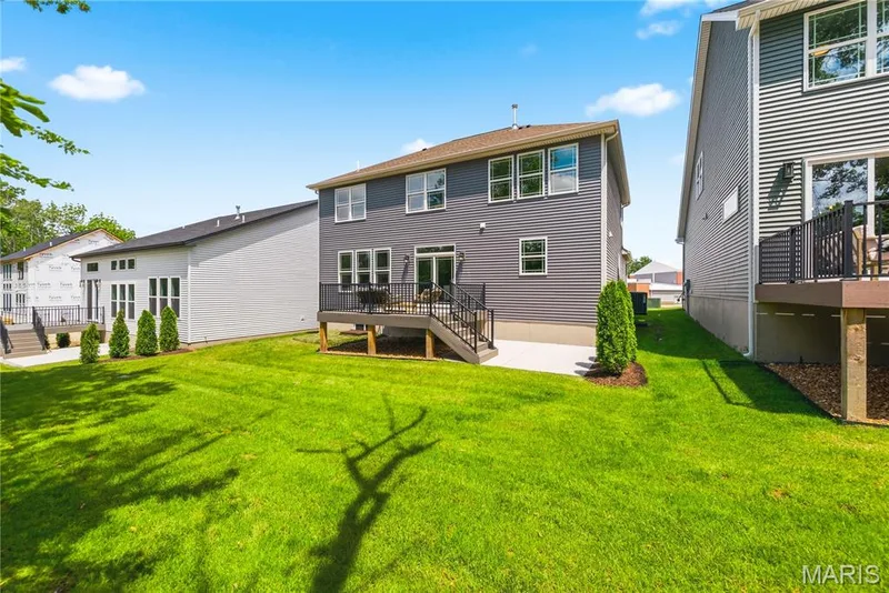 Rear Elevation with Composite Deck and Patio — 527 Ryehill Drive, St Peters, MO 63376
