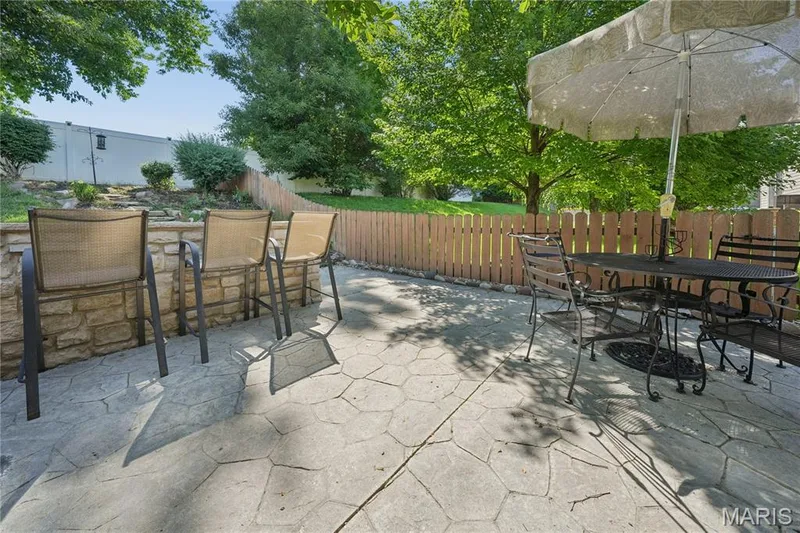 Patio with bar — 814 Emerald Place Drive, St Charles, MO 63304