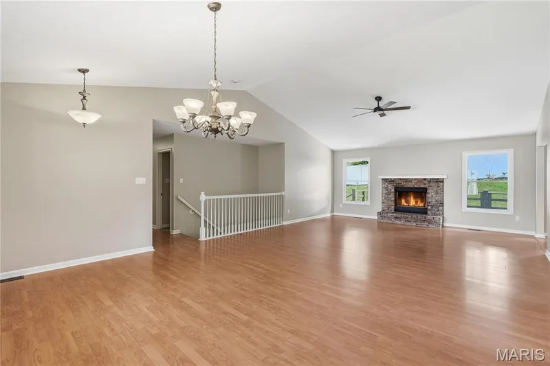 Vaulted ceilings and  cozy fireplace — 814 Emerald Place Drive, St Charles, MO 63304