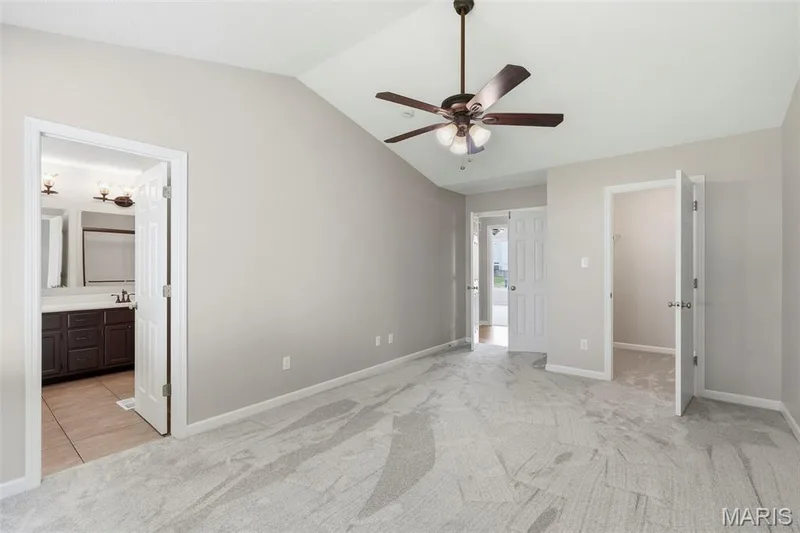 Vaulted ceiling with a ceiling fan — 814 Emerald Place Drive, St Charles, MO 63304