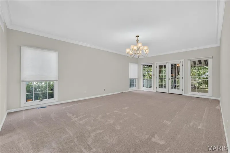 Large primary bedroom with access to the deck — 16557 Baxter Forest Ridge Drive, Chesterfield, MO 63005