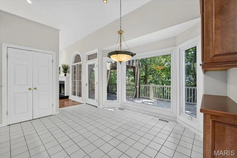 Eat-in area with views of lush backyard — 16557 Baxter Forest Ridge Drive, Chesterfield, MO 63005