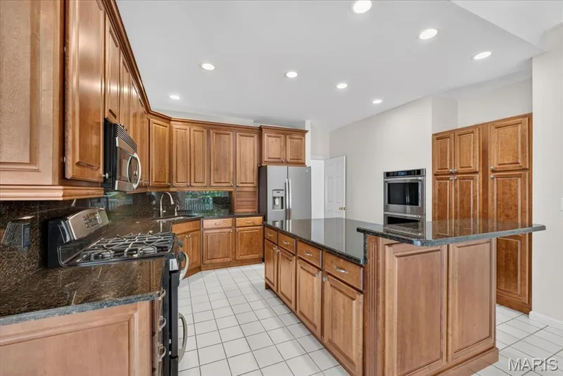 Double ovens and additional oven in the range — 16557 Baxter Forest Ridge Drive, Chesterfield, MO 63005