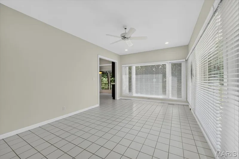 Loads of windows in the sunroom — 16557 Baxter Forest Ridge Drive, Chesterfield, MO 63005