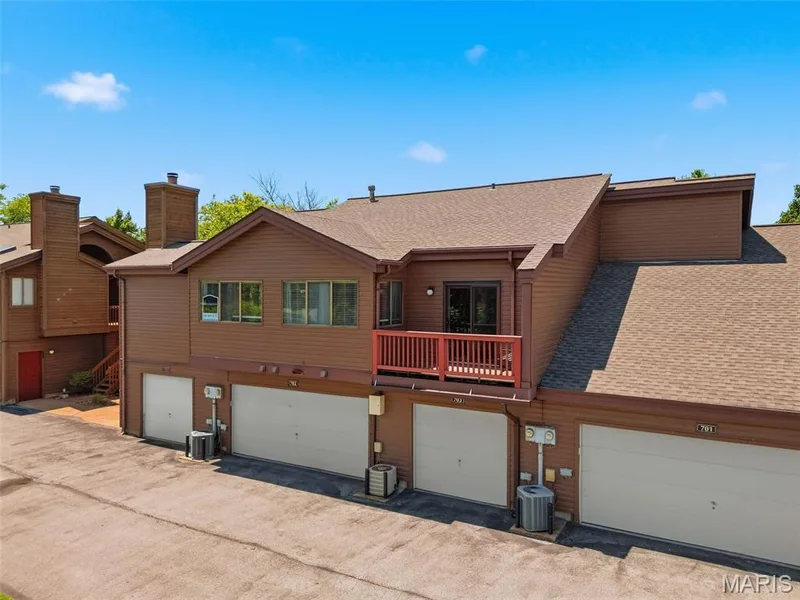 Private balcony off of primary bedroom — 704 Hemingway Lane #E, Weldon Spring, MO 63304