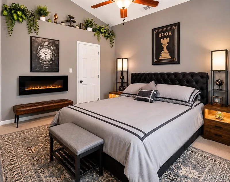 Vaulted ceiling, room featuring a  wall niche, and ceiling fan with lighting — 704 Hemingway Lane #E, Weldon Spring, MO 63304