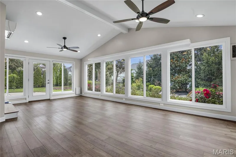 Sunroom with door that leads you to outdoor patio. — 2154 White Lane Drive, Chesterfield, MO 63017