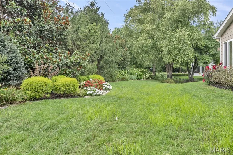 Mature trees and landscaped garden beds with flowering shrubs to give you privacy indoors and out. — 2154 White Lane Drive, Chesterfield, MO 63017