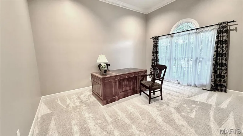 Recessed lighting, crown molding, arched transom window, and expansive window with double curtain rods — 2154 White Lane Drive, Chesterfield, MO 63017