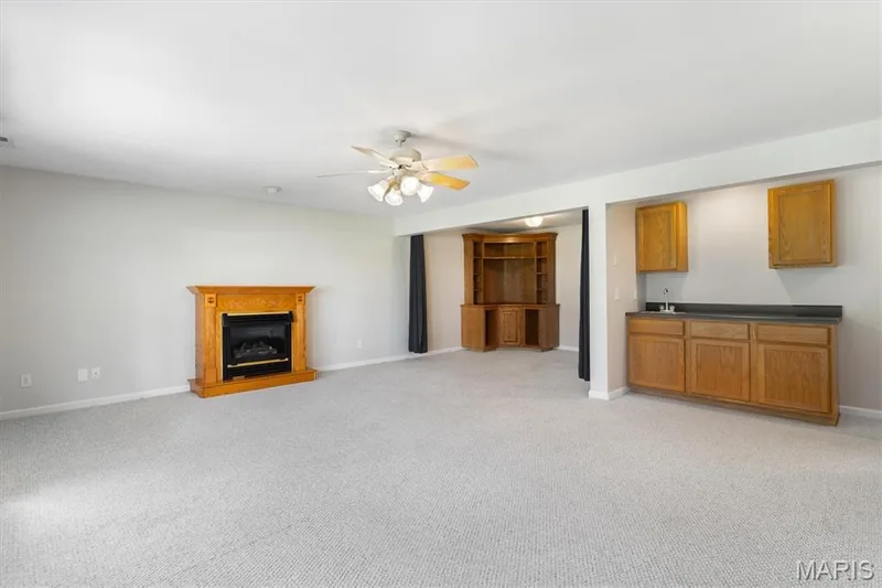 Rec room has gas fireplace & wet bar. — 6 Country Bluff Court, St Charles, MO 63301