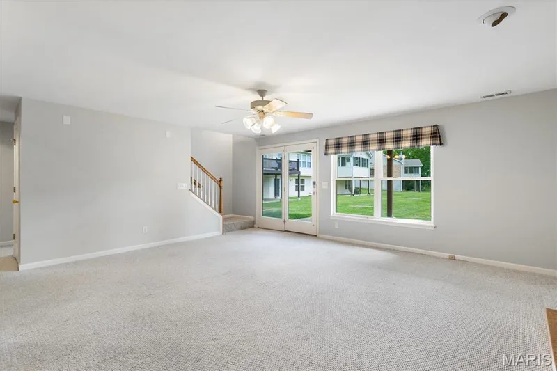 Rec room has walk-out & large window to concrete patio and common ground. — 6 Country Bluff Court, St Charles, MO 63301