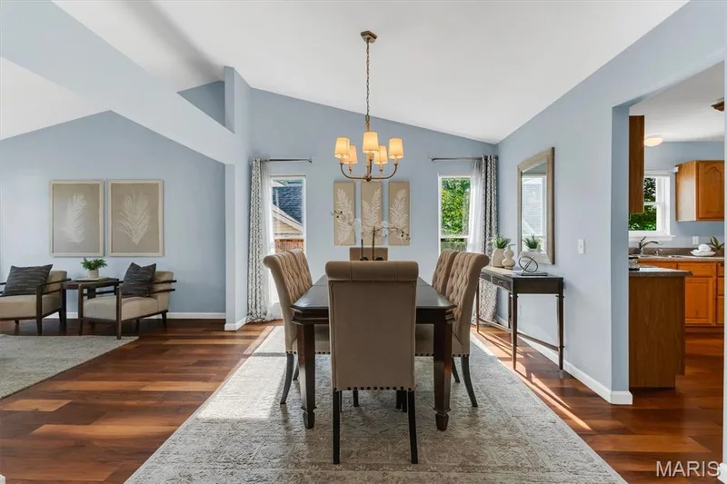 Vaulted dining and living areas. — 6 Country Bluff Court, St Charles, MO 63301