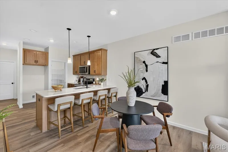 Pictures of a Bristol floor plan.  Some options shown may be optional upgrades — 108 Cottle Creek Way, Cottleville, MO 63304
