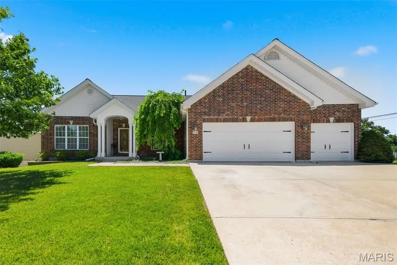 Front of home with brick elevation — 202 Highland Meadows Drive, Wentzville, MO 63385