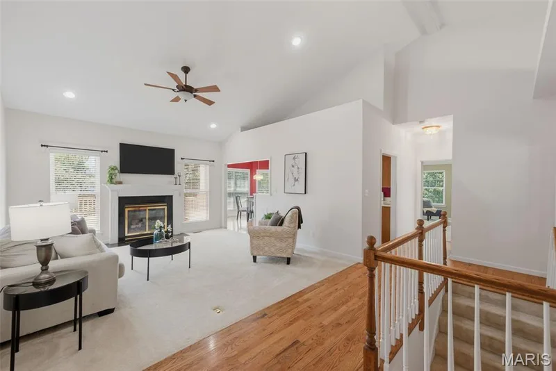Vaulted ceilings in living room make the space feel even more spacious! — 202 Highland Meadows Drive, Wentzville, MO 63385