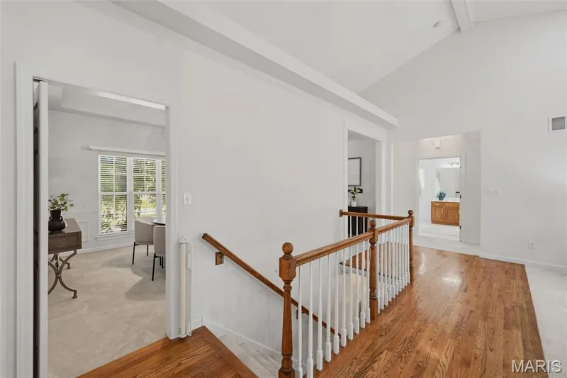 Stairway to walk-out lower level — 202 Highland Meadows Drive, Wentzville, MO 63385