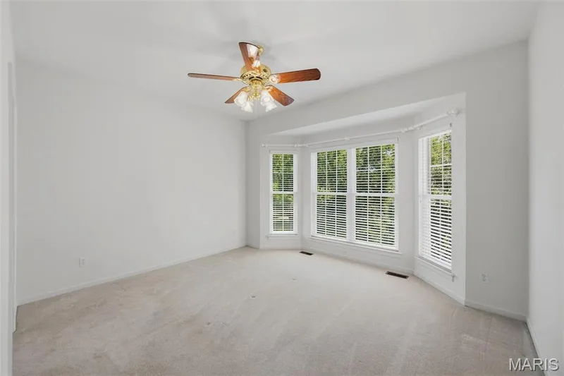 2nd bedroom has tons of natural light with the bay window & 3ft doorways for accessibility — 202 Highland Meadows Drive, Wentzville, MO 63385