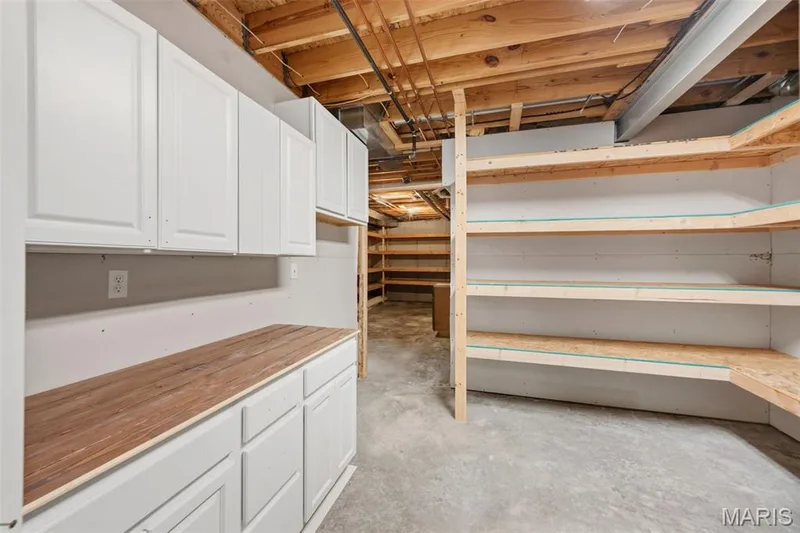 Tons of additional cabinetry & shelving to keep you organized! — 202 Highland Meadows Drive, Wentzville, MO 63385