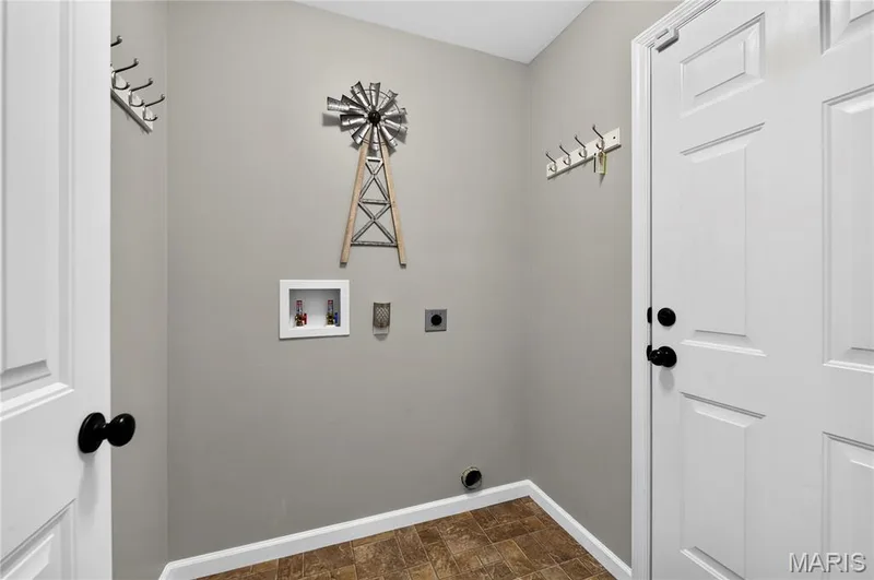 main floor laundry — 708 Bellingrath Gardens Court, Wentzville, MO 63385