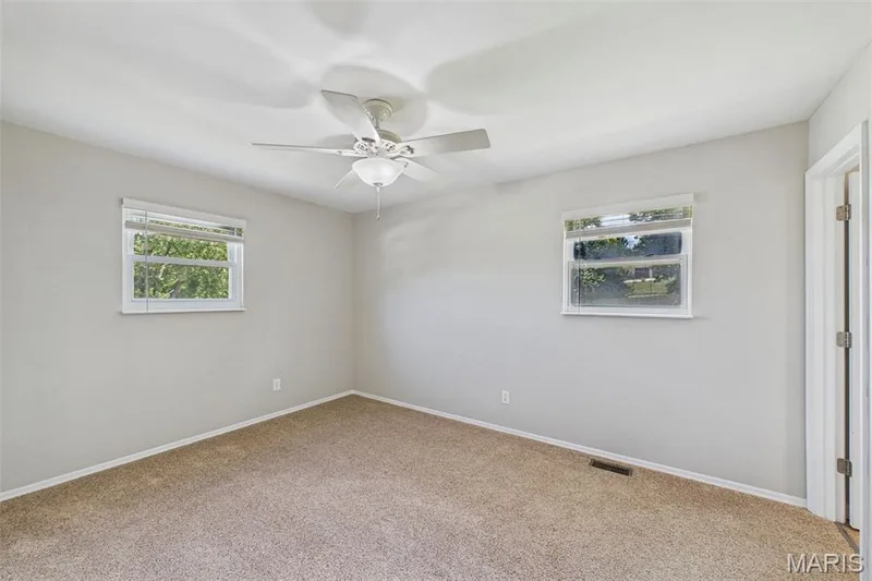 The primary suite has a full bathroom and a custom closet — 656 Nancy Drive, St Charles, MO 63301