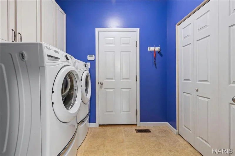 Laundry Room with Large Storage Area! — 1744 Briarmanor Drive, Lake St. Louis, MO 63367