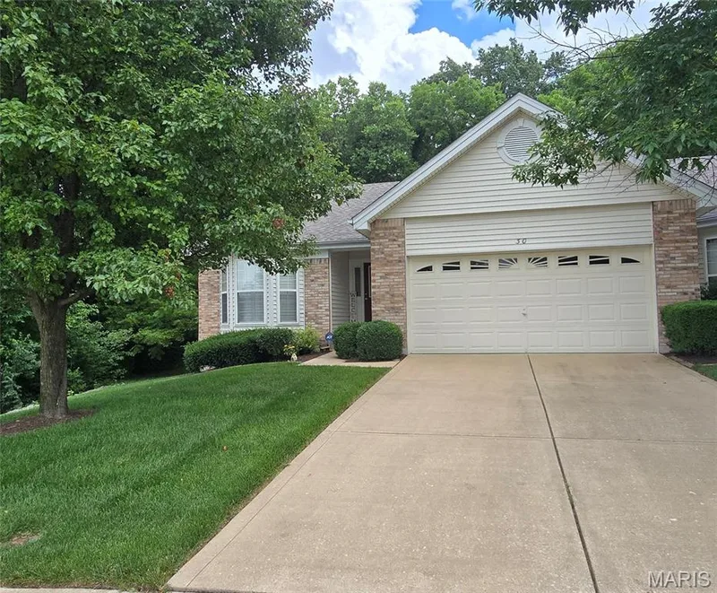 Exquisite villa w pictuesque private end unit view  w neighbhood lake await you.  Soaring ceilings and light filled open floor plan. 2 car garage and covered — 30 Sterling Pointe Drive #22A, St Charles, MO 63301