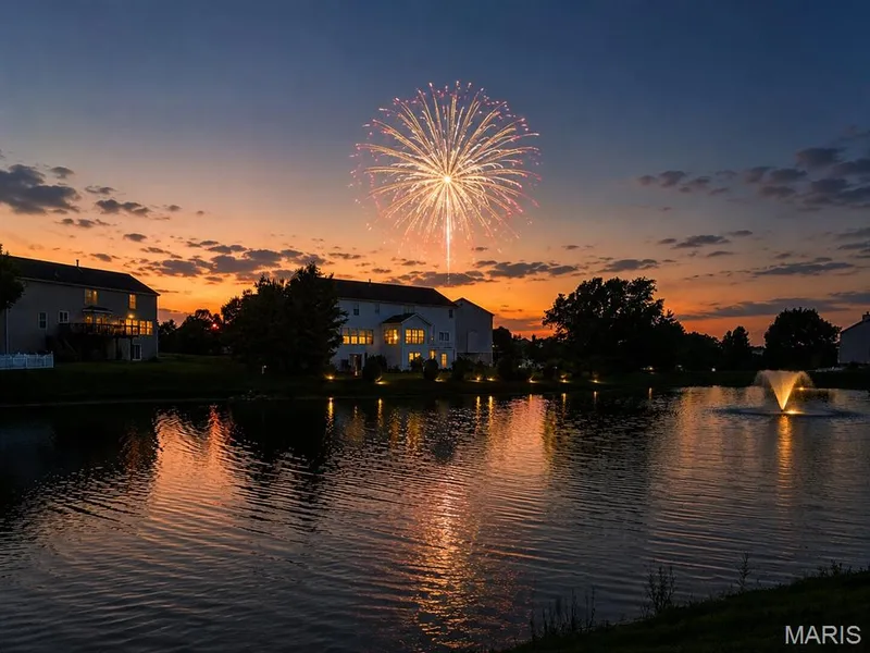 The sunset view from the back of the home is simply stunning, and you might even catch a firework or two. — 535 Garrick Place, O'Fallon, MO 63368