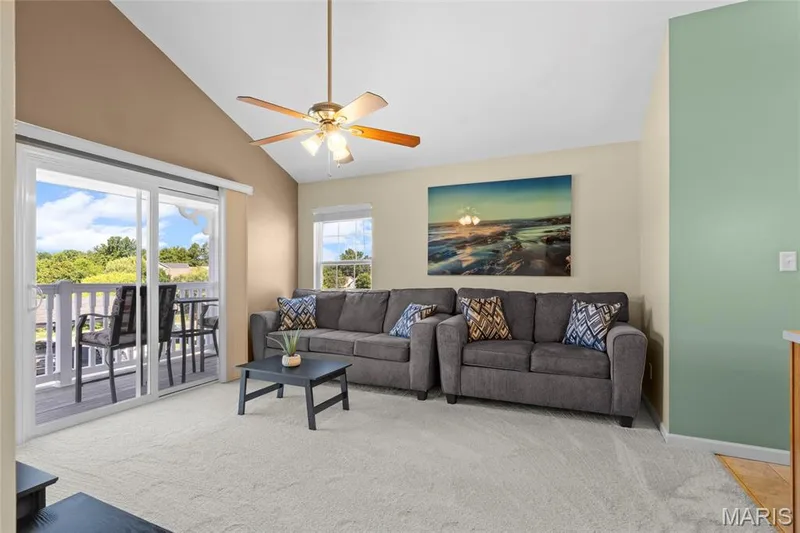 family room with vaulted ceiling and fan — 1233 Saravalle Drive, St Peters, MO 63376