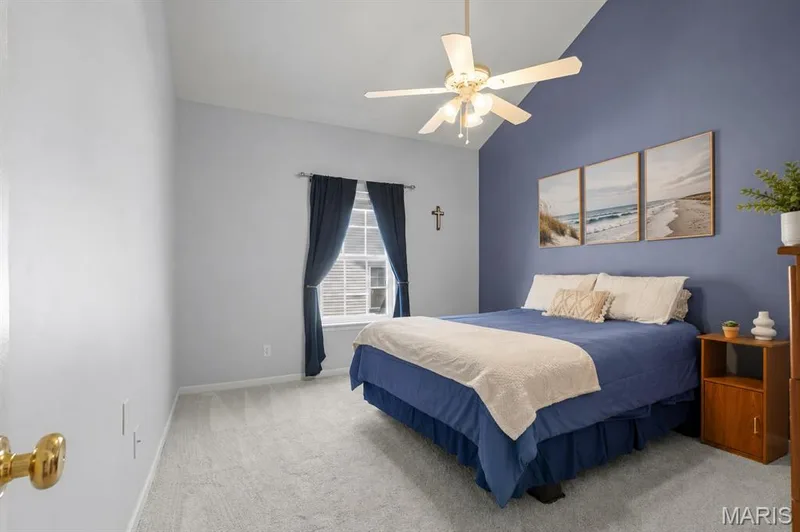 primary bedroom featuring vaulted ceilings — 1233 Saravalle Drive, St Peters, MO 63376