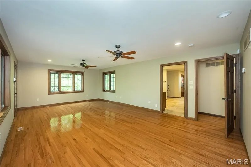 Unfurnished room with light wood-style flooring, recessed lighting, a ceiling fan, and baseboards — 2731 Christy Avenue, Wildwood, MO 63040