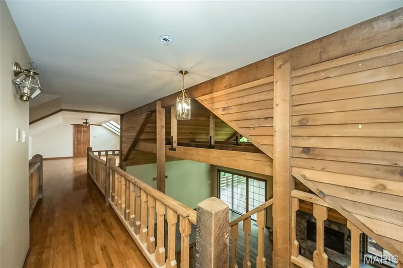 Stairs featuring wood finished floors — 2731 Christy Avenue, Wildwood, MO 63040