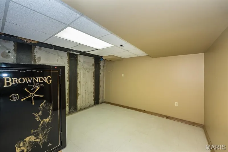 Finished basement with tile patterned floors and baseboards — 2731 Christy Avenue, Wildwood, MO 63040