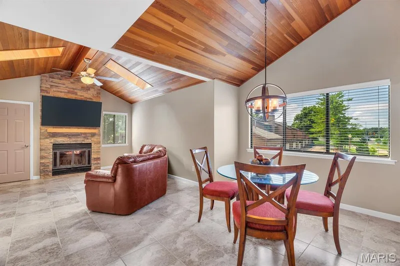 Vaulted wood-finish ceilings with skylights — 309 Hemingway Lane, Weldon Spring, MO 63304