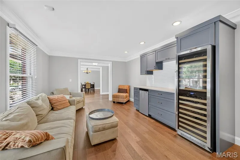 The living room is a wonderful entertaining space- See for yourself!  Look at that wine cooler! — 2024 Meadowbrook Way Drive, Chesterfield, MO 63017